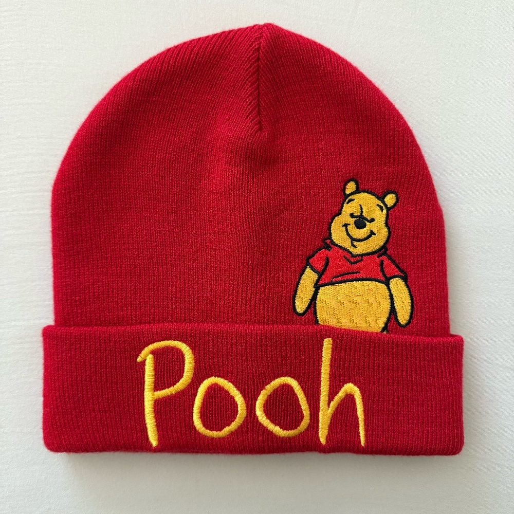 Red Disney Pooh Bear beanie in new condition